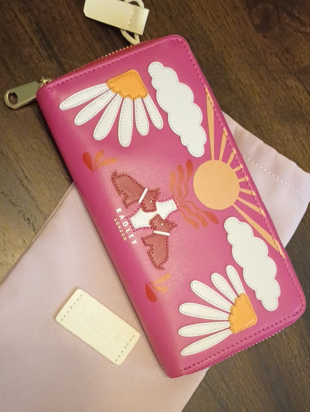 Radley London zip wallet rising sun dogs pink floral